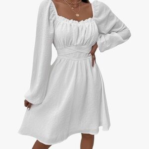 White off the shoulder dress with tie detail
